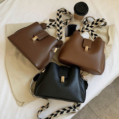 Minimalist Bucket Bag with Geometric Strap