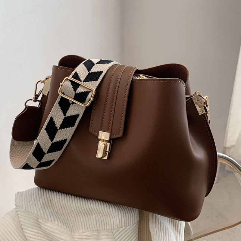 Minimalist Bucket Bag with Geometric Strap