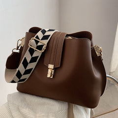 Minimalist Bucket Bag with Geometric Strap