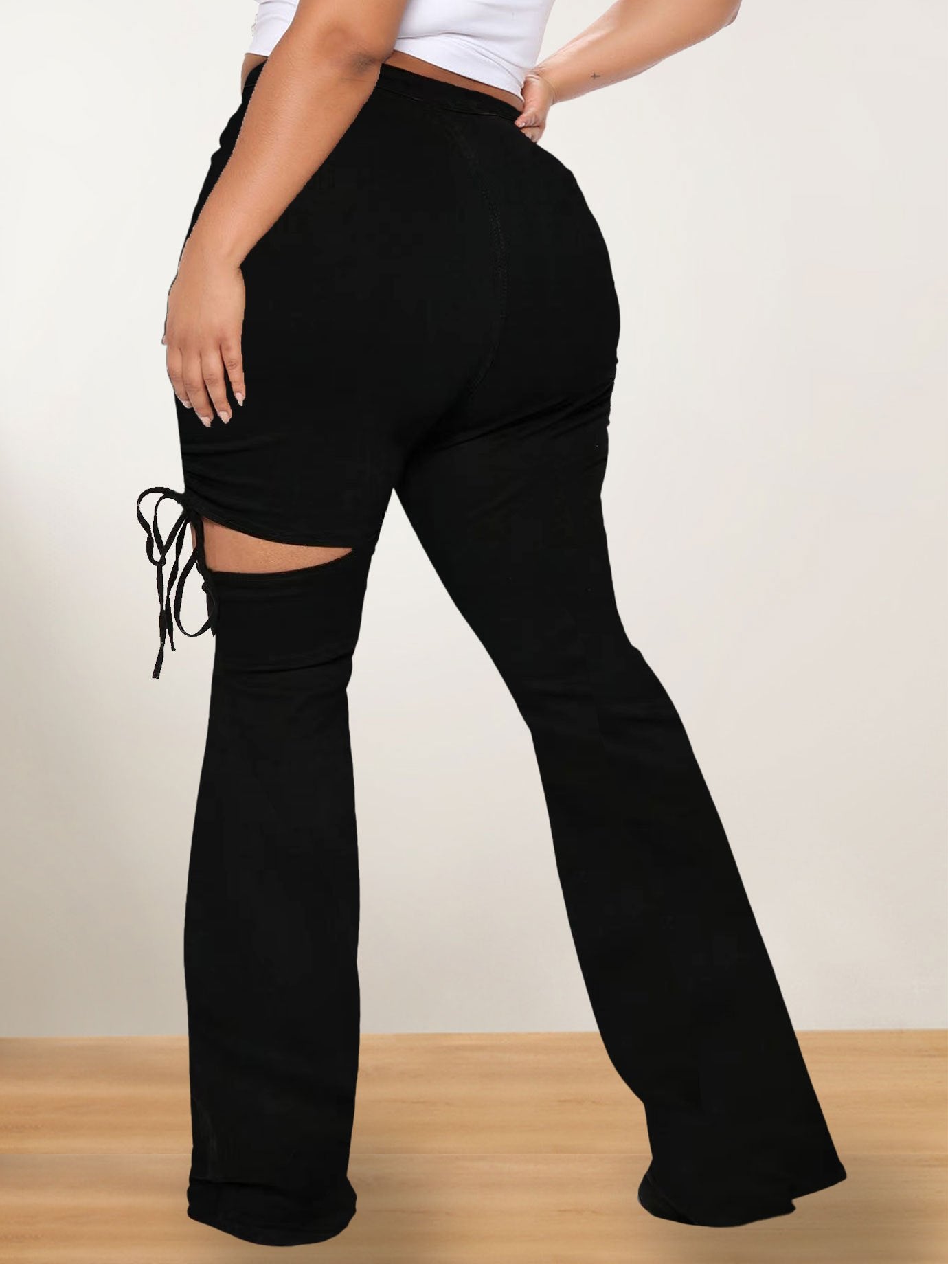  High Rise Ripped Side Tie Flared Leg Jeans