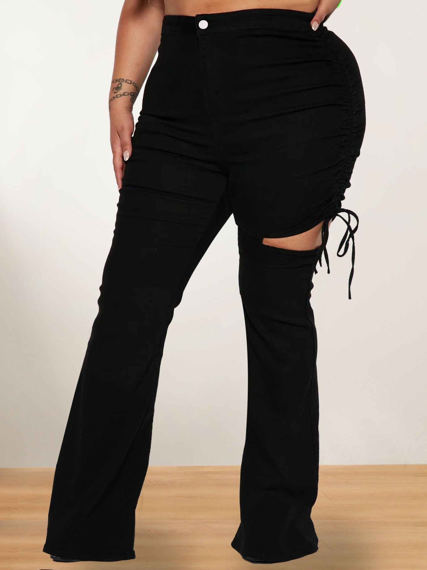  High Rise Ripped Side Tie Flared Leg Jeans