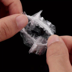 100/200 Disposable Waterproof Plastic Earmuffs - Shower/Bath