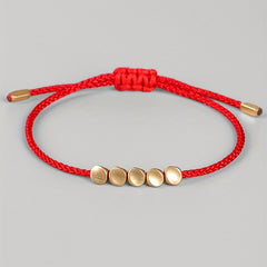 Handwoven Red Rope Bracelet with Copper Beads