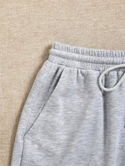  Solid High Rise Drawstring Loose Shorts