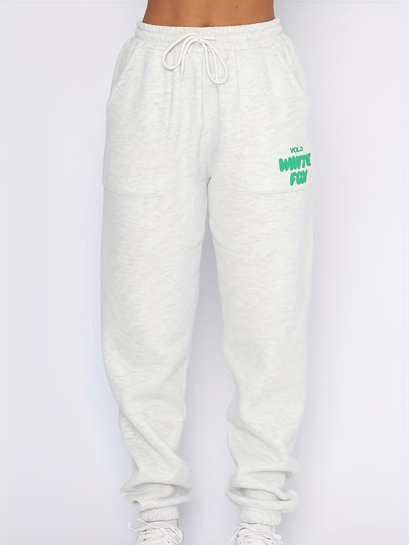 Plus Size Elastic Waist Tie Front Joggers With Pockets