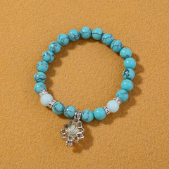 Stone Smooth Bracelet with Lotus Pendant Glowing Beads