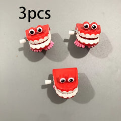 3pcs Colorful Clockwork Jumping Teeth Toys with Eyes Red Yellow Orange Purple