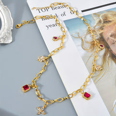 Adjustable Copper Necklace with Four Leaf Clover & Red Cubic Zirconia Pendant