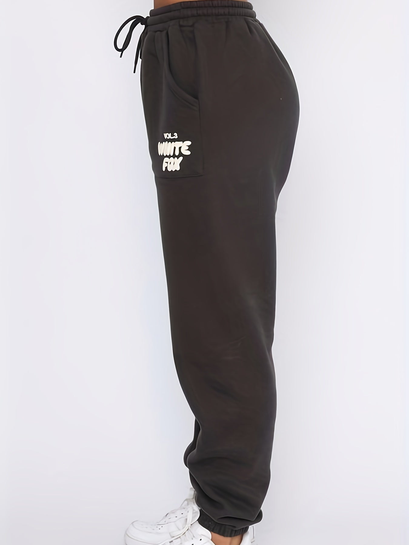 Plus Size Elastic Waist Tie Front Joggers With Pockets