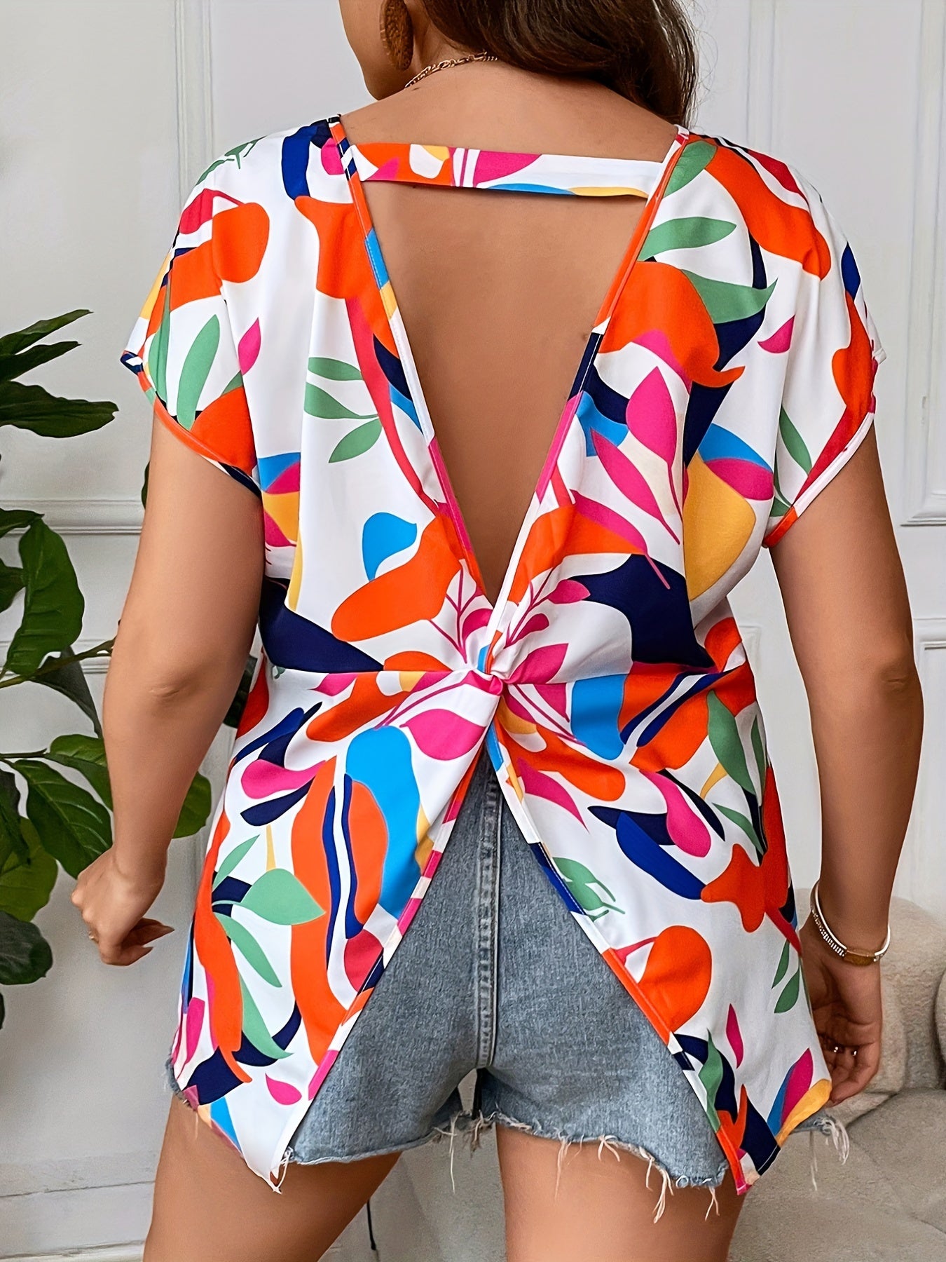  Floral Print Twist Back Bat Sleeve Top