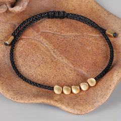 Handwoven Red Rope Bracelet with Copper Beads