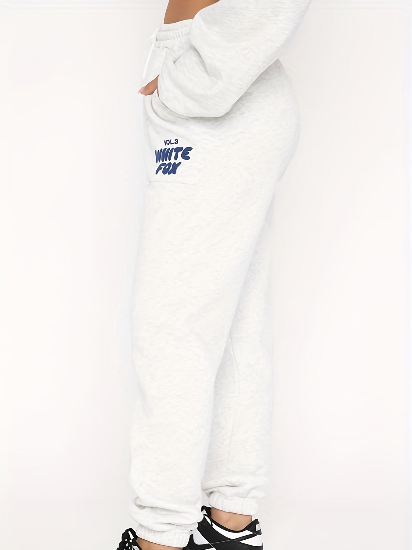 Plus Size Elastic Waist Tie Front Joggers With Pockets