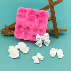 Silicone Mold with Chocolate Fondant and 4 Small Bows for Cake Decorating