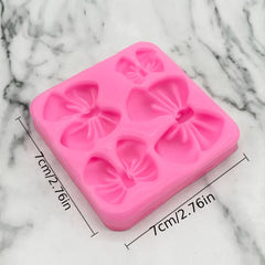 Silicone Mold with Chocolate Fondant and 4 Small Bows for Cake Decorating