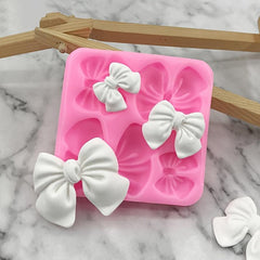 Silicone Mold with Chocolate Fondant and 4 Small Bows for Cake Decorating