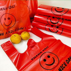 50pcs Red Smiling Face Plastic Vest Bag for Supermarket and Handbag