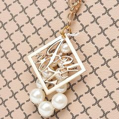 Geometric Pattern Shoulder Bag with Pearl Pendant