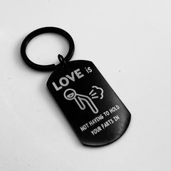 Love Is Not Holding Your Farts Keychain