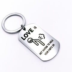 Love Is Not Holding Your Farts Keychain