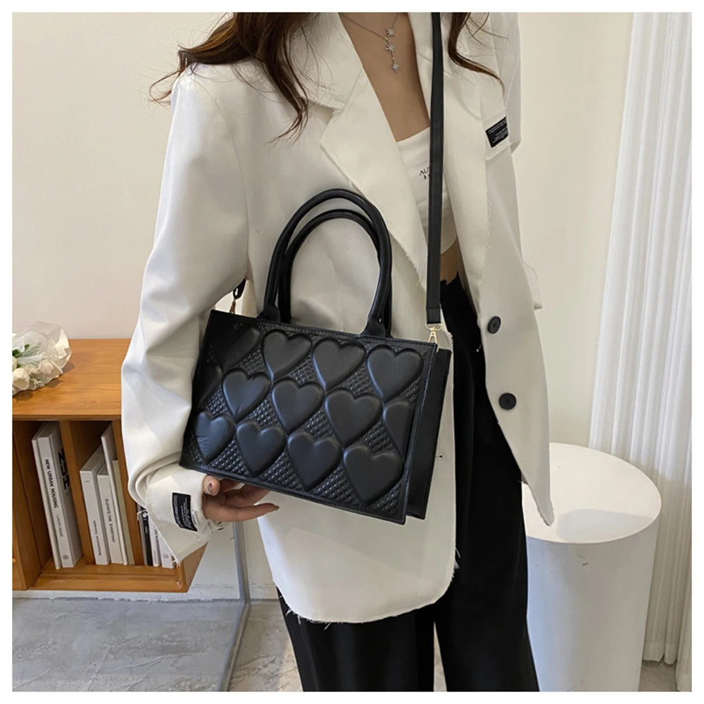 Textured Shoulder Bag with Heart Embossed Design