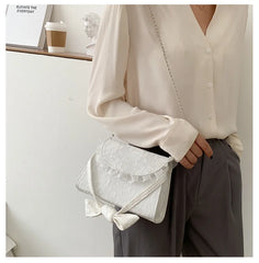 Embossed Lace Up Bow Handle Women Shoulder Bag