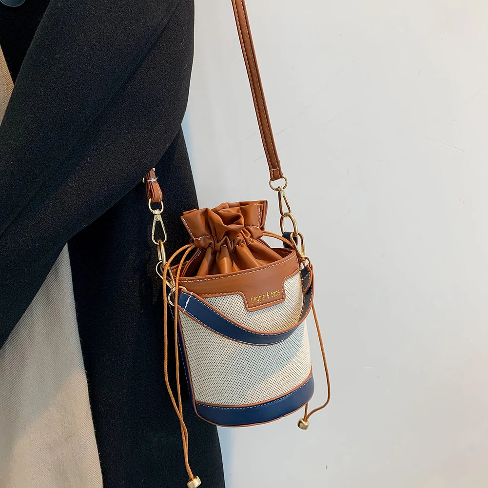 Vintage Patchwork Drawstring Crossbody Bag Cylinder PU Leather Handbag