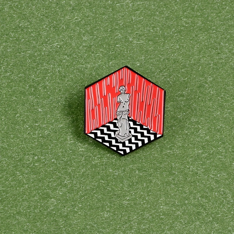 Severed Arm Plaster Figure Hexagonal Brooch Lapel