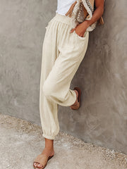  Solid Elastic High Rise Loose Fit Jogger Trousers With Pockets