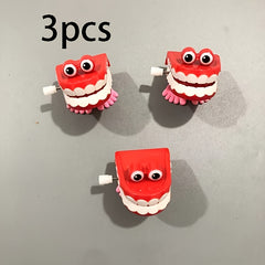 3pcs Colorful Clockwork Jumping Teeth Toys with Eyes Red Yellow Orange Purple