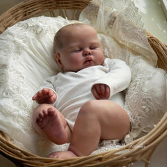 Realistic 19-Inch Vinyl Sleeping Doll with Closed Eyes