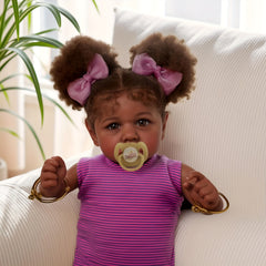 JIZHI 20 Lifelike Reborn Youngsters Doll with Caramel Eyes & Pink Skirt