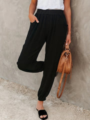  Solid Elastic High Rise Loose Fit Jogger Trousers With Pockets